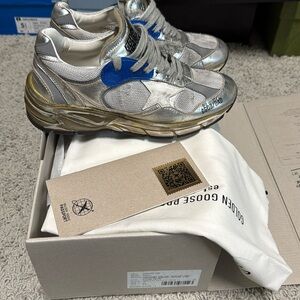 Golden goose dad sneakers